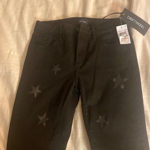 Womens black star skinny jeans